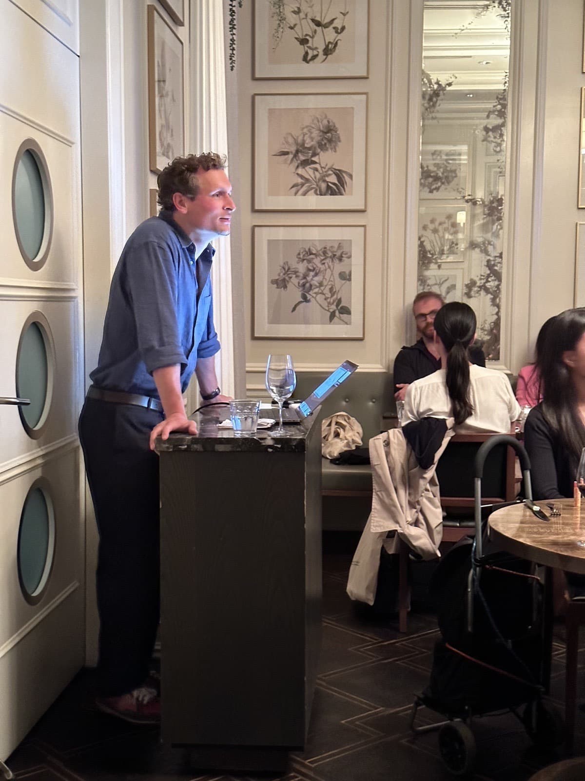 Dr. Kefferputz speaking at a podium